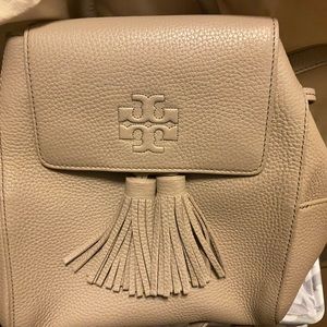 Tory Burch backpack. I’d rather sell it than move it.Make me a reasonable offer!
